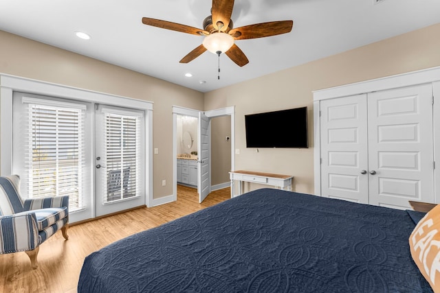 bedroom with access to outside, connected bathroom, ceiling fan, and light hardwood / wood-style floors