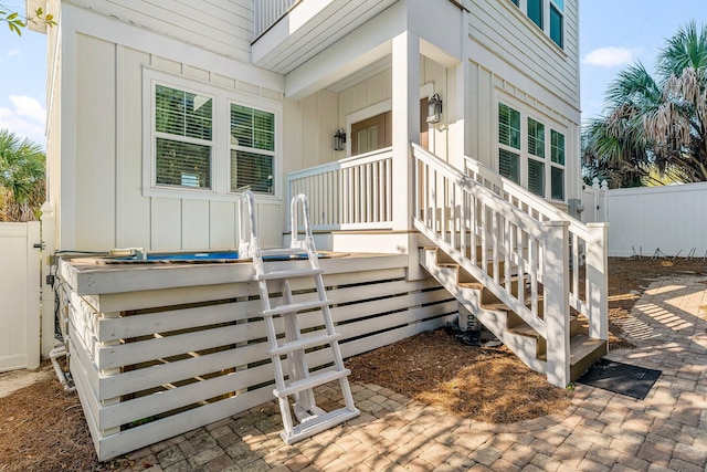 doorway to property featuring a porch