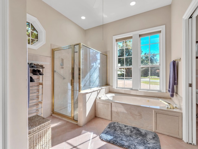 bathroom with tile patterned floors, plus walk in shower, and toilet