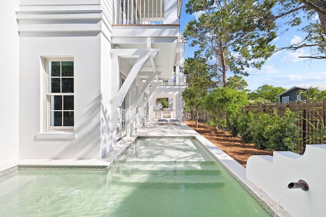 view of swimming pool with a pergola and a patio