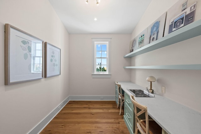 office with hardwood / wood-style flooring