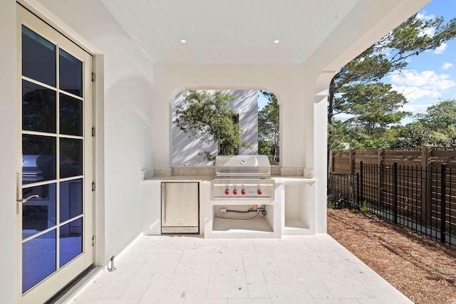 view of patio featuring area for grilling and grilling area