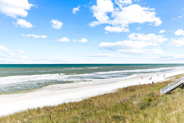 property view of water featuring a beach view