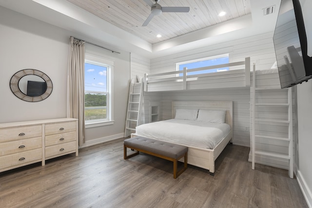 326 E Lakeshore Dr, Panama City Beach, FL 32413 - bedroom featuring wood ceiling, a tray ceiling, wood finished floors, a ceiling fan, and recessed lighting