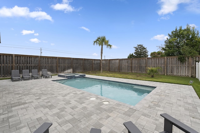 326 E Lakeshore Dr, Panama City Beach, FL 32413 - view of pool with a patio area, a pool with connected hot tub, and a fenced backyard
