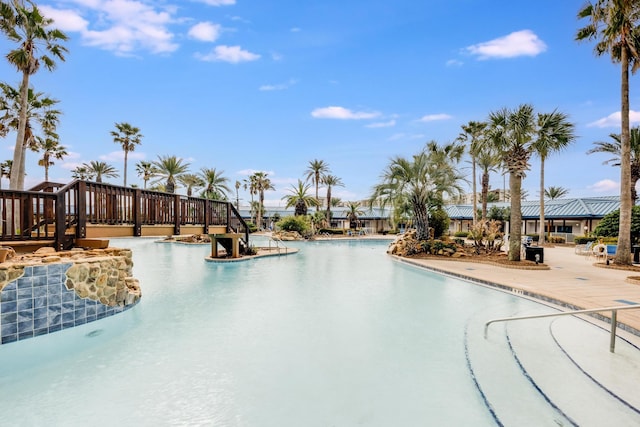 view of swimming pool with a patio area