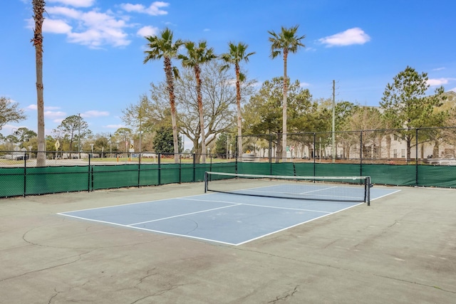 view of sport court with basketball hoop