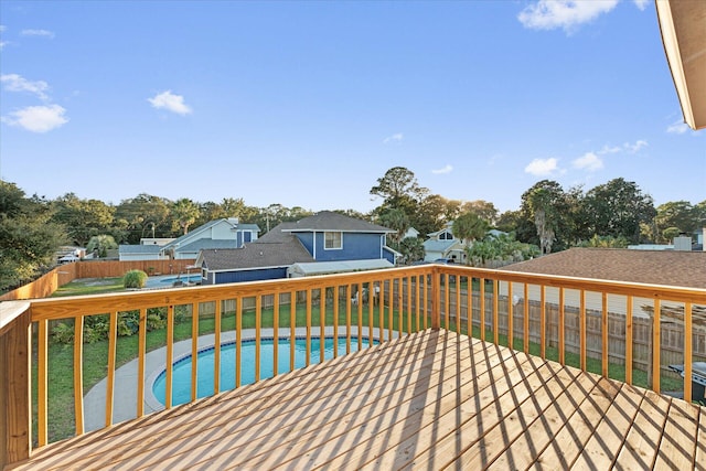 wooden terrace with a yard