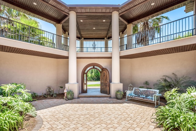 exterior space featuring a balcony and a patio