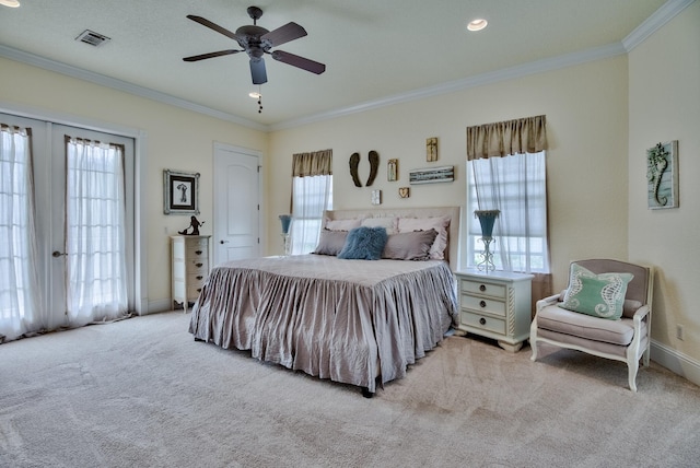 bedroom with ceiling fan, crown molding, light carpet, and french doors