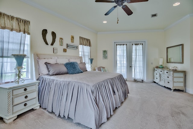 bedroom featuring access to outside, french doors, ceiling fan, ornamental molding, and light colored carpet