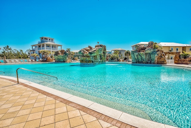 view of pool featuring pool water feature