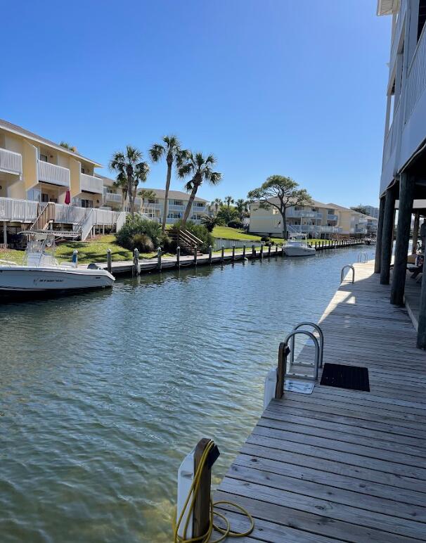 dock area featuring a water view