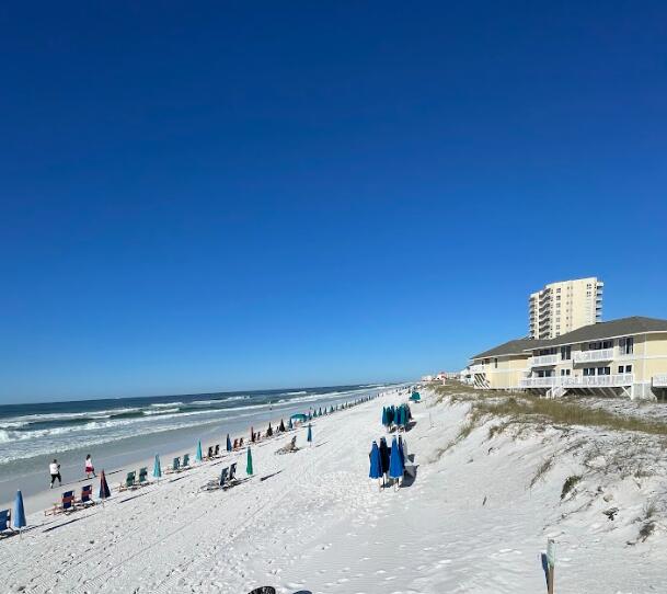 property view of water featuring a view of the beach