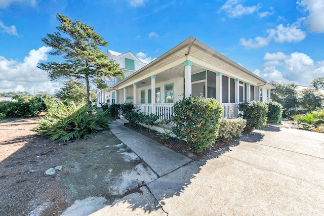 view of home's exterior featuring a porch