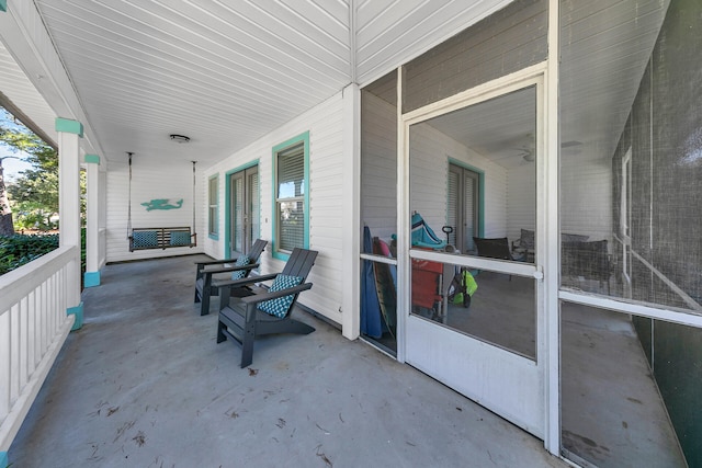 view of patio featuring a porch