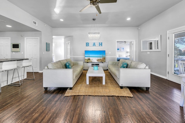 living room featuring dark wood-type flooring