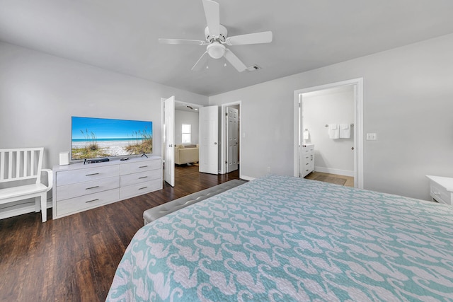 bedroom with ensuite bath, ceiling fan, and dark wood-type flooring