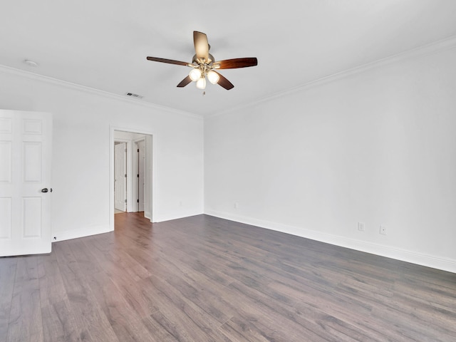 unfurnished room with ceiling fan, dark hardwood / wood-style flooring, and ornamental molding