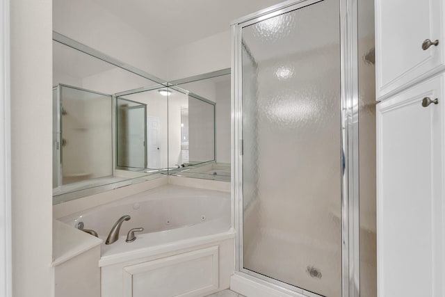 bathroom featuring plus walk in shower