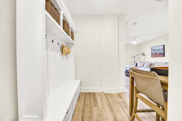 mudroom with light hardwood / wood-style flooring and ceiling fan