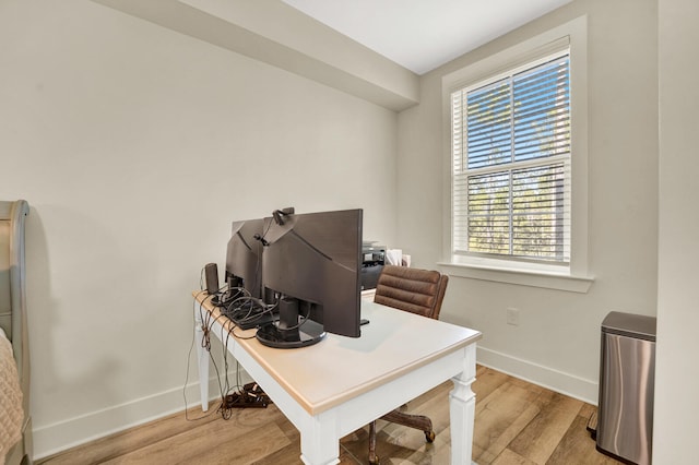 home office featuring light hardwood / wood-style floors