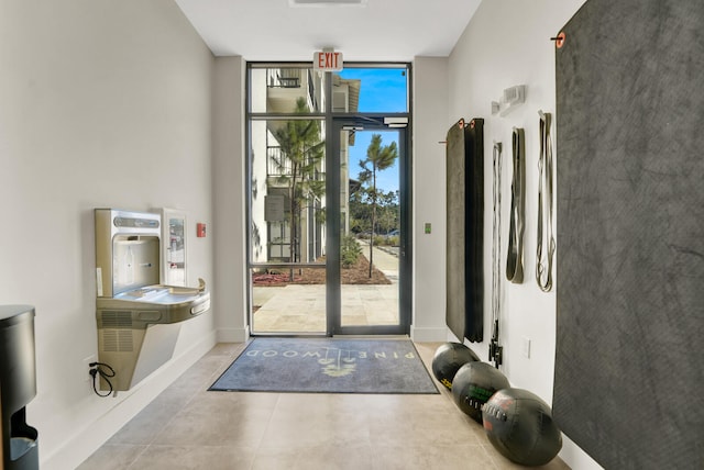 doorway featuring floor to ceiling windows