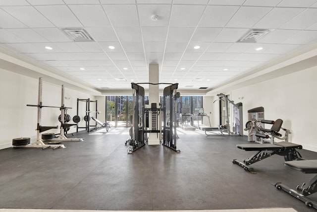 gym featuring a paneled ceiling