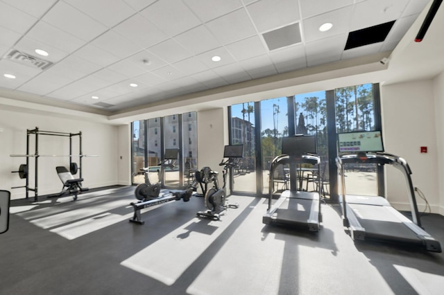 179 S County Highway 393 # 324, Santa Rosa Beach, FL 32459 - gym with baseboards, a drop ceiling, and a raised ceiling