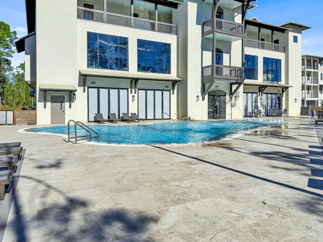 179 S County Highway 393 # 324, Santa Rosa Beach, FL 32459 - community pool featuring a patio area