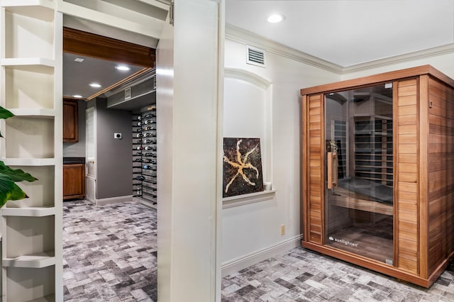 interior space featuring crown molding