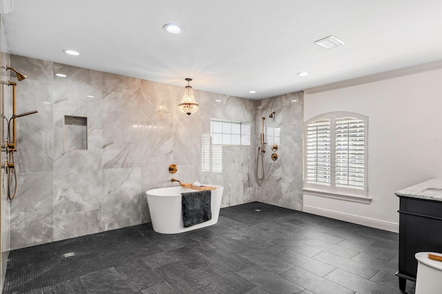 bathroom featuring vanity and separate shower and tub