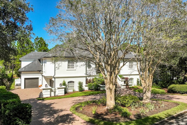 view of front of home with a garage