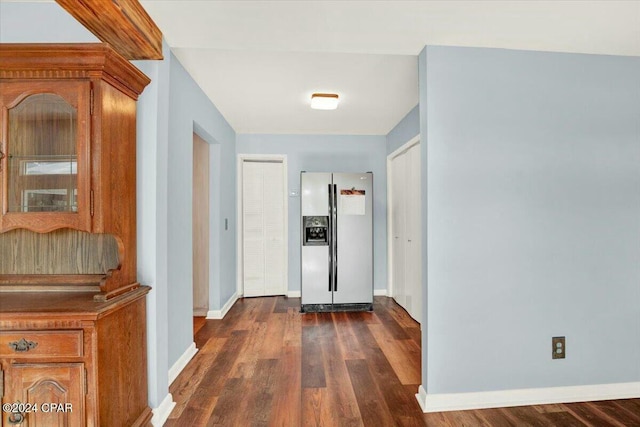 hall featuring dark wood-type flooring