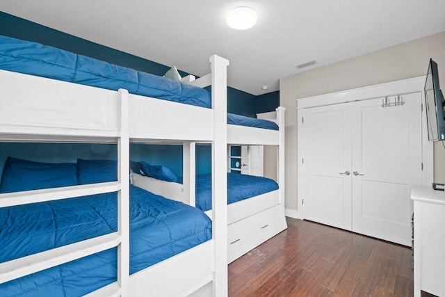 unfurnished bedroom featuring dark hardwood / wood-style floors