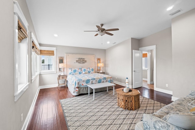 bedroom with hardwood / wood-style floors and ceiling fan