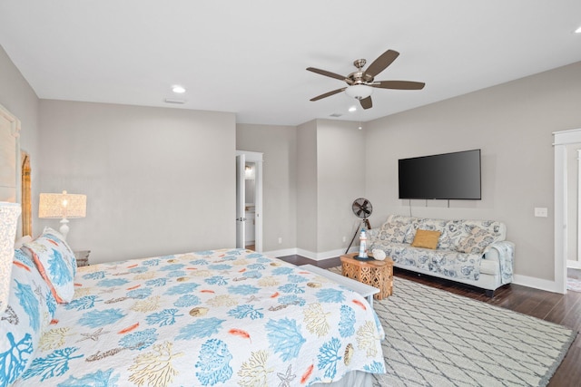 bedroom featuring ceiling fan and dark hardwood / wood-style floors