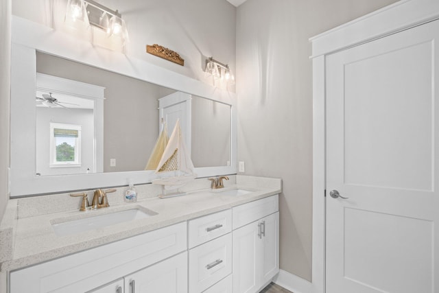 bathroom with vanity and ceiling fan