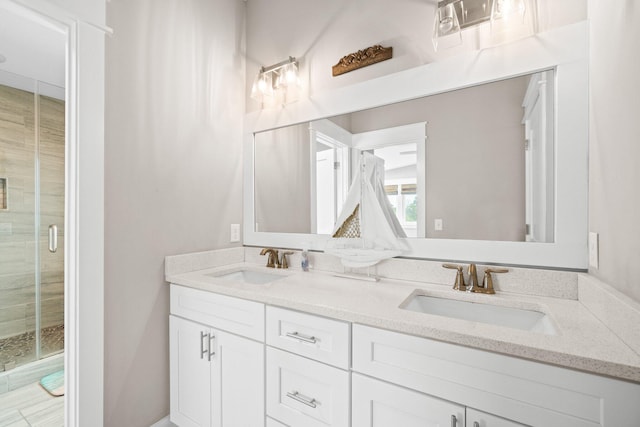 bathroom with vanity and an enclosed shower