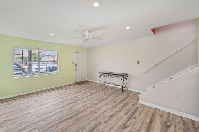 interior space featuring ceiling fan and light hardwood / wood-style floors