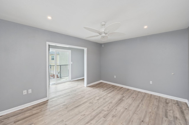 unfurnished room featuring light hardwood / wood-style flooring and ceiling fan