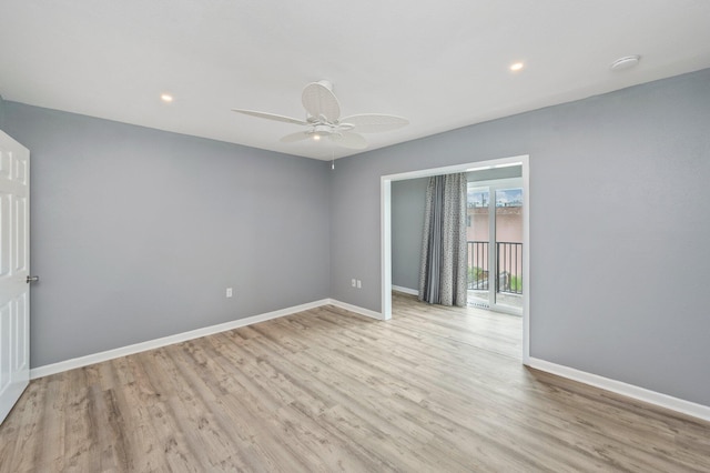 unfurnished room with light wood-type flooring and ceiling fan