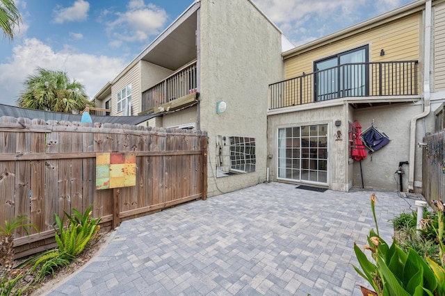 view of patio / terrace with a balcony