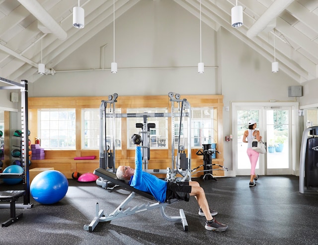 workout area featuring vaulted ceiling