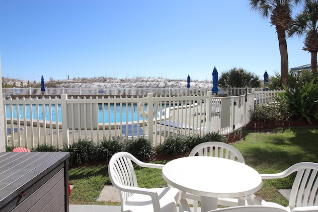 view of patio / terrace with a community pool