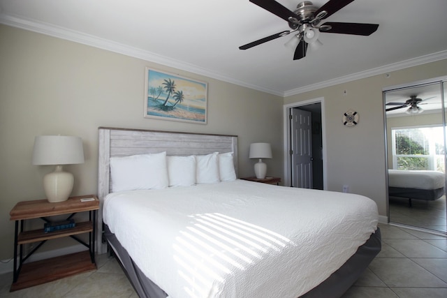 bedroom with ceiling fan, light tile patterned floors, and ornamental molding