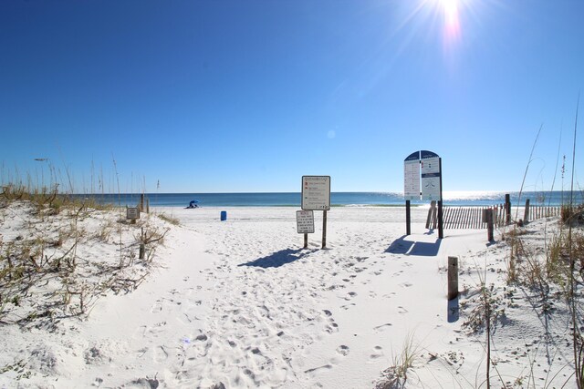 property view of water featuring a view of the beach