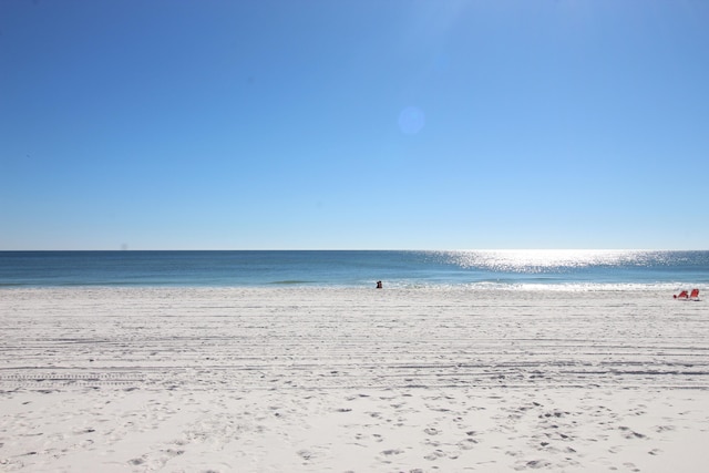 view of water feature with a beach view