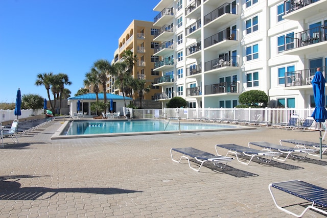 view of swimming pool featuring a patio