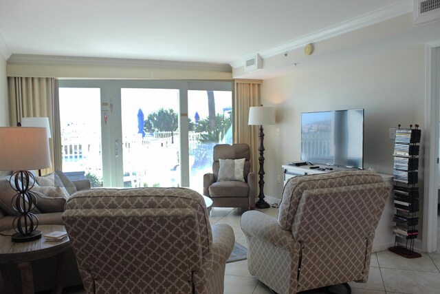 living room featuring crown molding and light tile patterned floors